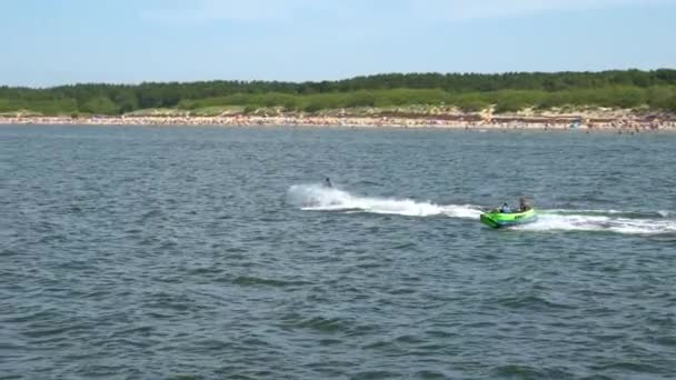 Tourists Towed Water Tube Tubing Attraction Towed Jet Ski Active — Video