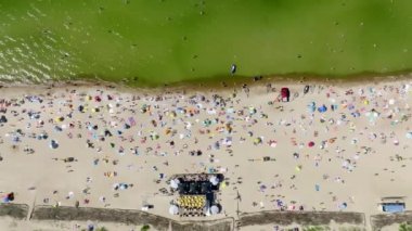 Aerial view of the beach and sea shore in Palanga, Lithuania. Beach town in Palanga with a lot of tourists.