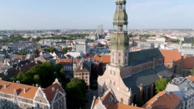 Beautiful aerial view of Riga city, the capital of Latvia. Aerial view of the St. Peters Church in the center of the old town.