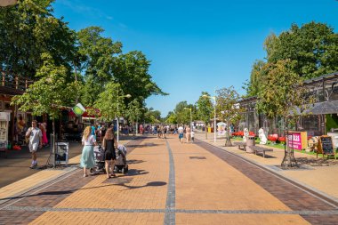 Palanga, Lithuania. August 10, 2022. The main street with crowds of people walking down the Palanga, enjoying beautiful summer time.