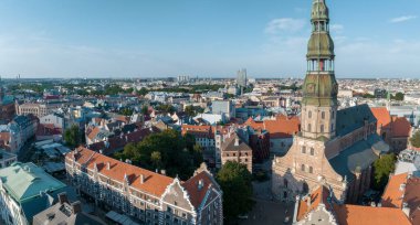 Beautiful aerial view of Riga city, the capital of Latvia. Aerial view of the St. Peter's Church in the center of the old town.