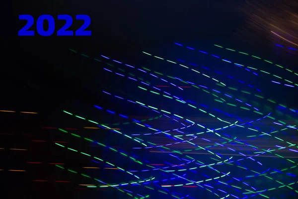 长时间曝光的圣诞灯的背景摘要 色彩斑斓的2022年黑色背景号码 — 图库照片