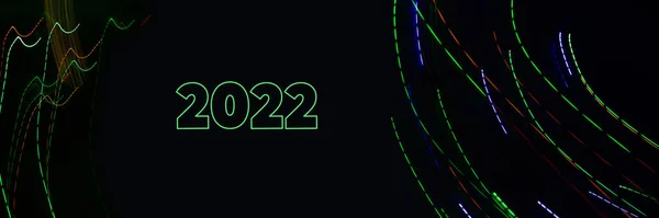 Абстрактный Фон Рождественских Огней Длительной Экспозицией Цветное Число 2022 Черном — стоковое фото