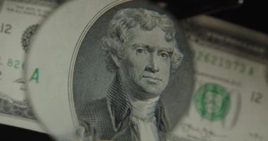 İki Amerikan Doları nakit makro görüntü. Büyütecin altında.. 