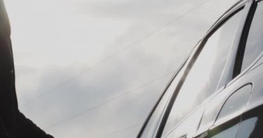 Business man sitting in a modern car