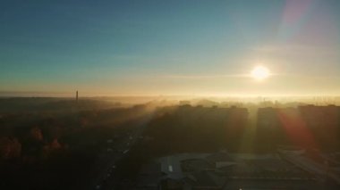 Autumn city of rivne ukraine, dawn with fog. Bus station area. Aerial shot.
