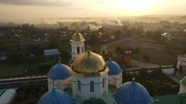 Aerial shot Village Mezhyrich. Holy Trinity Monastery Of The UPC. Ukraine. High quality 4k footage
