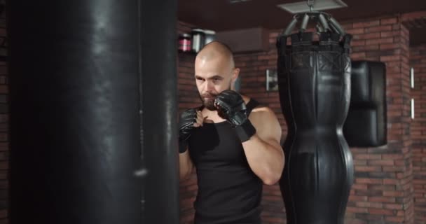 Athletic Man Punches Pear Honing His Fighting Technique Training Gym — Stockvideo