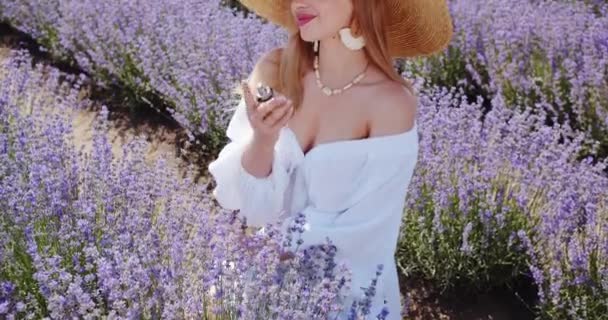 Beautiful Girl Applies Perfume Her Body Enjoys Smell — Stockvideo