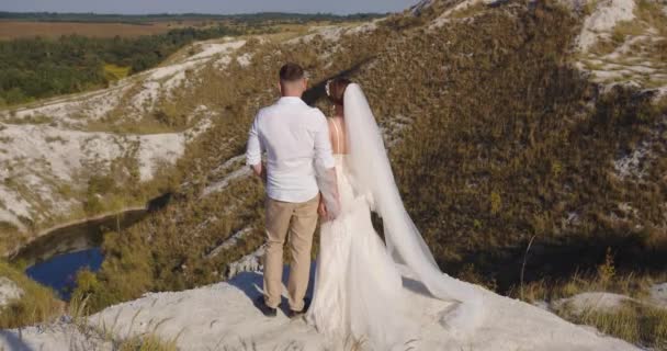 Groom Bride Festive Clothes Holding Hands Walk — Stockvideo