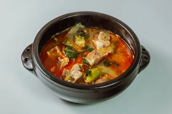 Ugeojigalbitang, Korean Cabbage and Short Rib Soup : Napa cabbage leaves slowly simmered in a beef rib stock and seasoned with doenjang (soybean paste). Ugeoji refers to the green outer layer of Napa cabbage or other leafy vegetables.