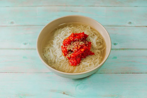 Hoenaengmyeon, Korean style Cold Buckwheat Noodles with Raw Fish : This dish consists of naengmyeon (cold buckwheat noodles) mixed with a spicy red chili powder and topped with pollock(sliced and seasoned raw skate) and vegetables, among others. The
