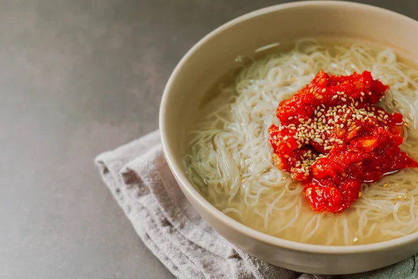 Hoenaengmyeon, Korean style Cold Buckwheat Noodles with Raw Fish : This dish consists of naengmyeon (cold buckwheat noodles) mixed with a spicy red chili powder and topped with pollock(sliced and seasoned raw skate) and vegetables, among others. The