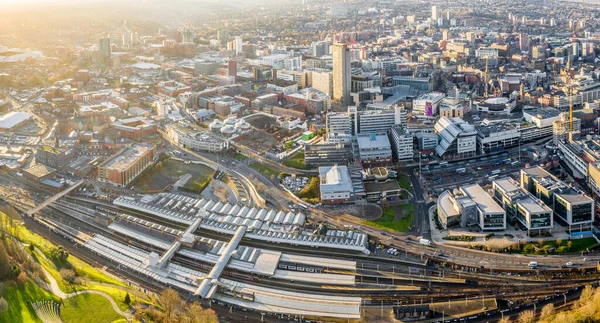 Aerial view of Sheffield city skyline with the train and tram station prominent 