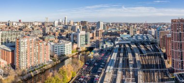 An aerial cityscape view of Leeds railway station providing transport links to the West Yorkshire conurbation