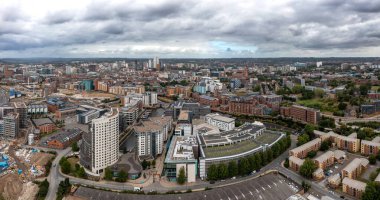 LEEDS, UK - AUGUST 19, 2022.  An aerial panorama cityscape of Leeds Dock area of the city centre with luxury waterfront properties at Roberts Wharf