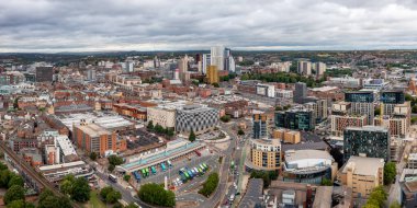 LEEDS, UK - AUGUST 24, 2022. Aerial view of Leeds city centre with bus station and transport links and Victoria shopping centre