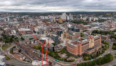 LEEDS, UK - AUGUST 24, 2022.  Aerial view of Leeds city skyline in West Yorkshire with Quarry House Government building and retail district