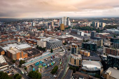 LEEDS, UK - SEPTEMBER 2, 2022. Aerial panorama view of Leeds city centre with bus station and Victoria shopping centre prominent during a dramatic sunrise