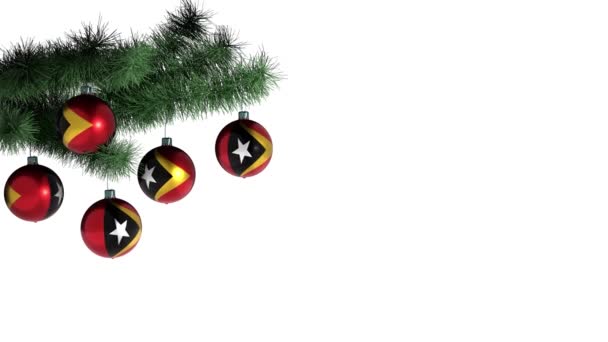 Χριστουγεννιάτικες Μπάλες Στο Χριστουγεννιάτικο Δέντρο Σημαία Του Ανατολικού Τιμόρ — Αρχείο Βίντεο
