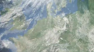 Dünyanın uzaydan şehire yakınlaşması. Üç boyutlu animasyon. Almanya 'nın Bielefeld şehrine yakınlaş. Video görüntülerini stokla. 4K