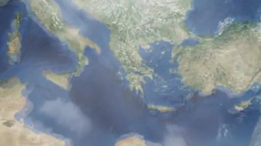 Dünyanın uzaydan şehire yakınlaşması. Üç boyutlu animasyon. Yunanistan 'ın Patras şehrine yakınlaş. Video görüntülerini stokla. 4K