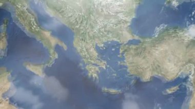Dünyanın uzaydan şehire yakınlaşması. Üç boyutlu animasyon. Yunanistan 'ın Volos şehrine yakınlaş. Video görüntülerini stokla. 4K
