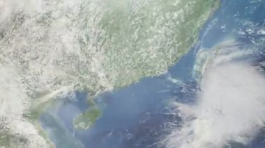 Dünyanın uzaydan şehire yakınlaşması. Üç boyutlu animasyon. Çin 'in Dongguan şehrine yakınlaş. Video görüntülerini stokla. 4K