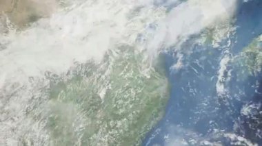 Dünyanın uzaydan şehire yakınlaşması. Üç boyutlu animasyon. Çin 'in Nanjing şehrine yakınlaş. Video görüntülerini stokla. 4K