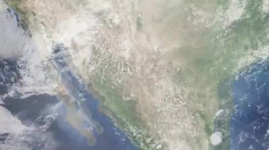 Dünyanın uzaydan şehire yakınlaşması. Üç boyutlu animasyon. Meksika 'nın Chihuahua şehrine yakınlaş. Video görüntülerini stokla. 4K
