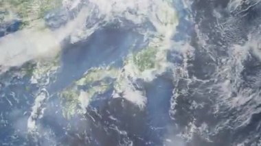 Dünyanın uzaydan şehire yakınlaşması. Üç boyutlu animasyon. Japonya 'nın Nagoya şehrine yakınlaş. Video görüntülerini stokla. 4K
