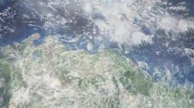 Dünyanın uzaydan şehire yakınlaşması. Üç boyutlu animasyon. Venezuela 'nın Barselona şehrine yakınlaş. Video görüntülerini stokla. 4K
