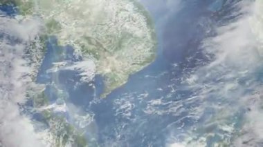 Dünyanın uzaydan şehire yakınlaşması. Üç boyutlu animasyon. Vietnam 'daki Vung Tau şehrine yakınlaş. Video görüntülerini stokla. 4K