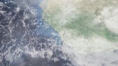 Dünyanın uzaydan şehire yakınlaşması. Üç boyutlu animasyon. Conakry, Gine şehrine yakınlaş. Video görüntülerini stokla. 4K
