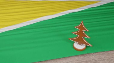 Masasında Guyana bayrağı olan zencefilli kurabiye evi.