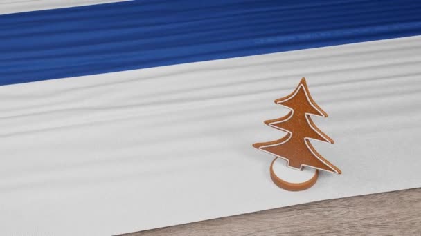 桌上挂芬兰国旗的姜饼屋 — 图库视频影像