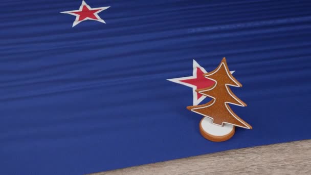 Gingerbread Σπίτι Σημαία Της Νέας Ζηλανδίας Στο Τραπέζι — Αρχείο Βίντεο