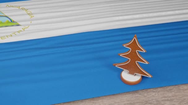Gingerbread Σπίτι Σημαία Της Νικαράγουας Στο Τραπέζι — Αρχείο Βίντεο