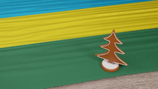桌上挂着卢旺达国旗的姜饼屋 — 图库视频影像