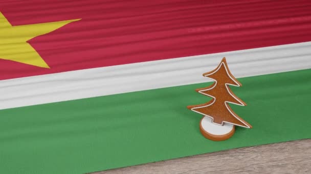 Gingerbread House Flag Suriname Table — Stock Video