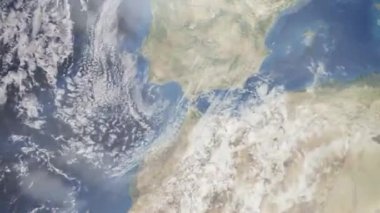 Dünyanın uzaydan şehire yakınlaşması. Üç boyutlu animasyon. Fas 'ın Tanca şehrine yakınlaş. Video görüntülerini stokla. 4K