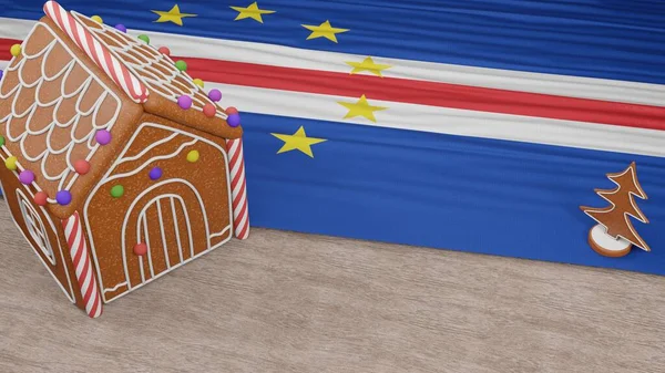 Masasında Cape Verde bayrağı olan zencefilli kurabiye evi.
