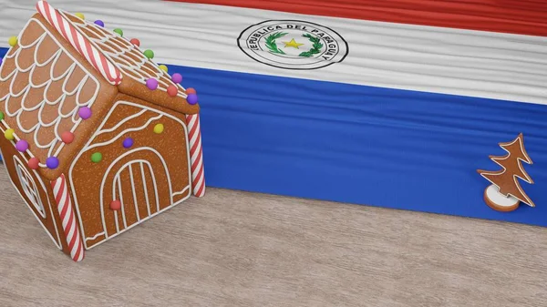 Masasında Paraguay bayrağı olan zencefilli kurabiye evi.