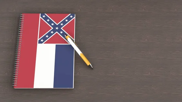 Een Notitieboekje Met Vlag Van Mississippi Een Liggende Pen — Stockfoto