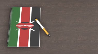 Kenya bayrağı ve yalancı bir kalemin olduğu bir defter.