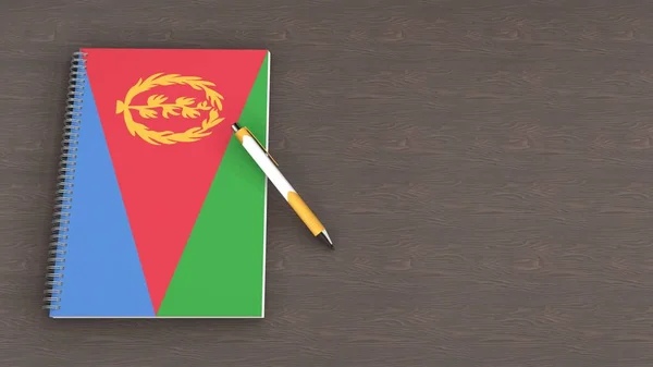 Eritre bayrağı ve yalancı bir kalemin olduğu bir defter.
