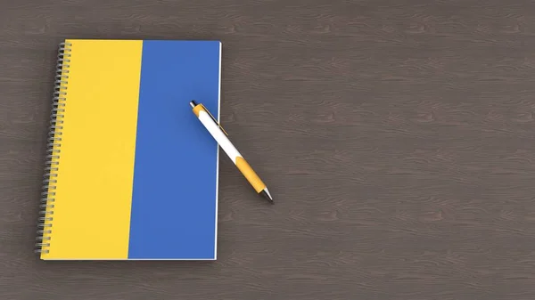 Ένα Σημειωματάριο Σημαία Της Ουκρανίας Και Ένα Στυλό Που Βρίσκεται — Φωτογραφία Αρχείου