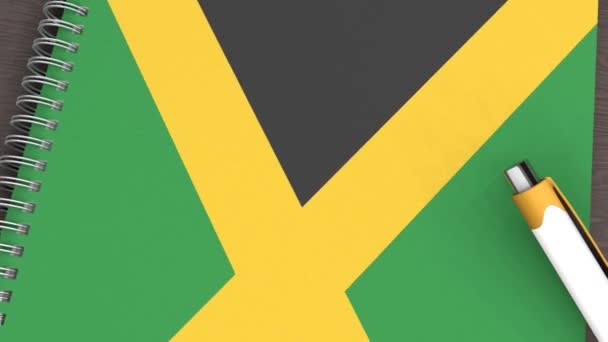 Cuaderno Con Bandera Jamaica Una Pluma Mentirosa — Vídeos de Stock