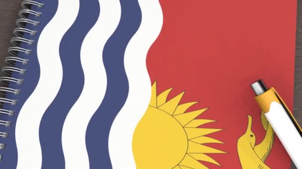 Cuaderno Con Bandera Kiribati Una Pluma Mentirosa — Vídeo de stock
