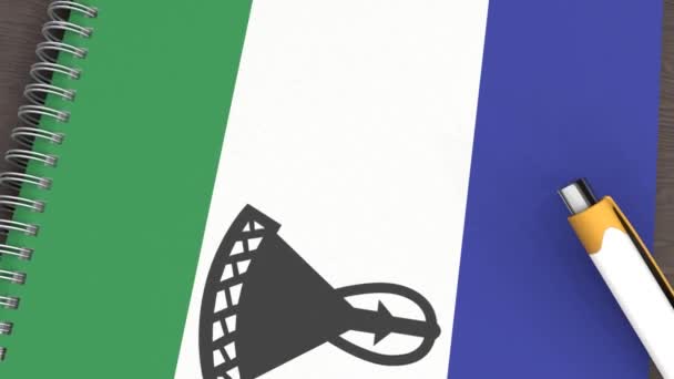 Notebook Flag Lesotho Lying Pen — Stockvideo